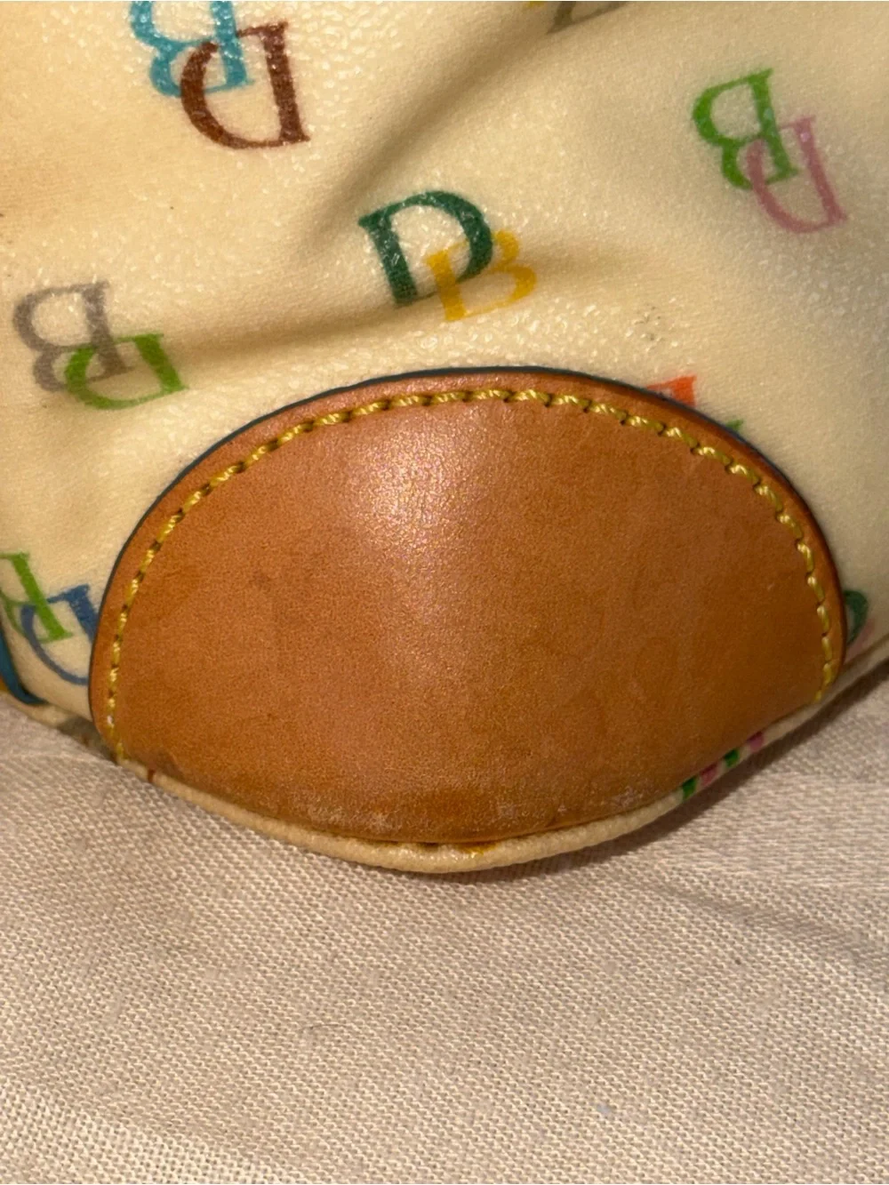 Dooney & Bourke Cream Multicolor DB Logo Satchel with Tan Trim
